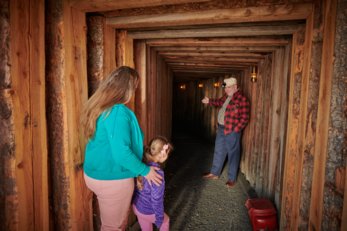 Mother and daughter taking a mine tour at Heritage Park