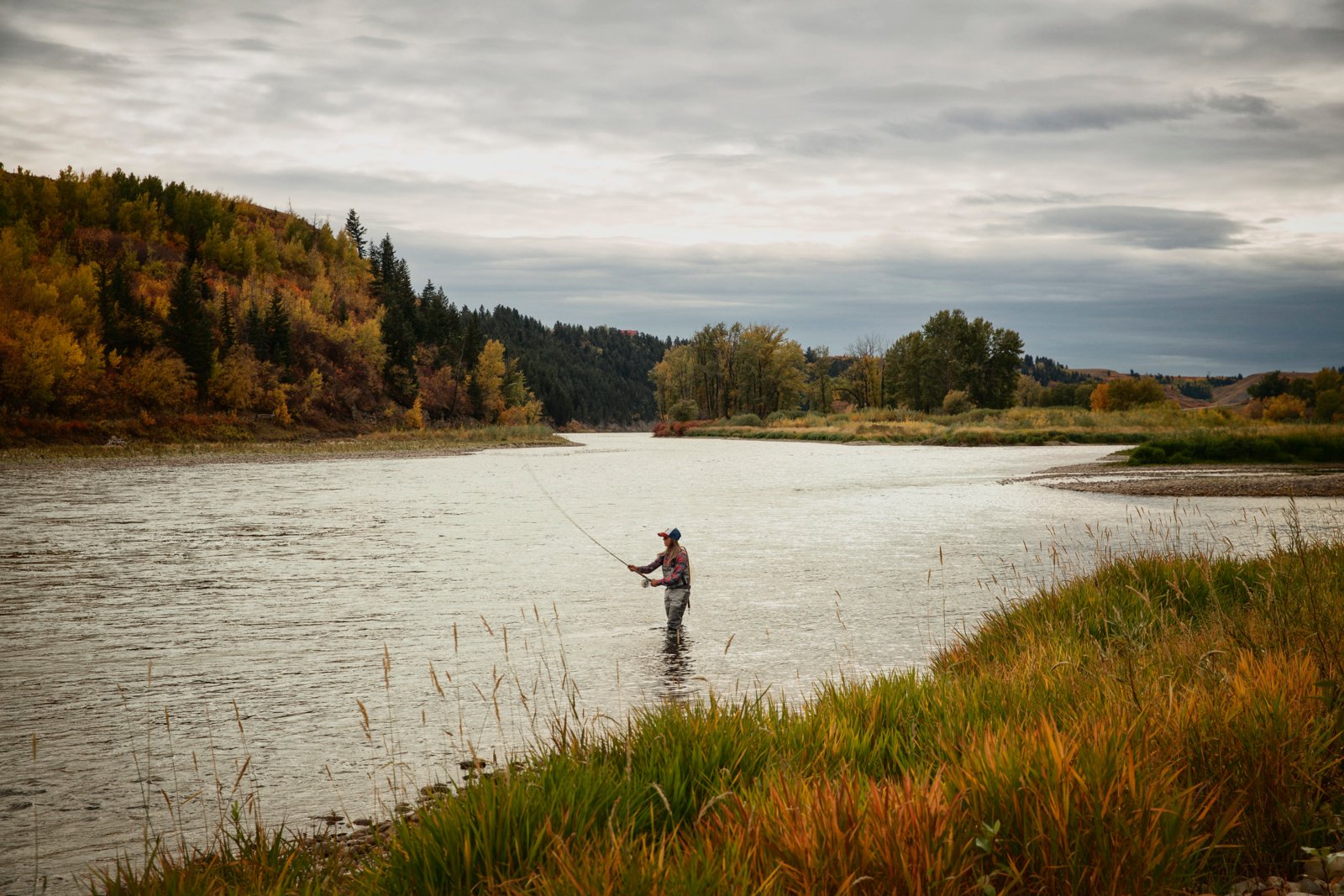 Paula Shearer fly-fishing in the Bow River