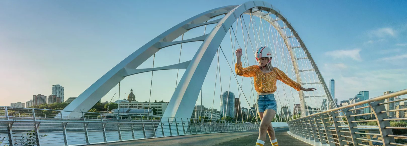 A girl roller-skates on the Walterdale Bridge in Edmonton