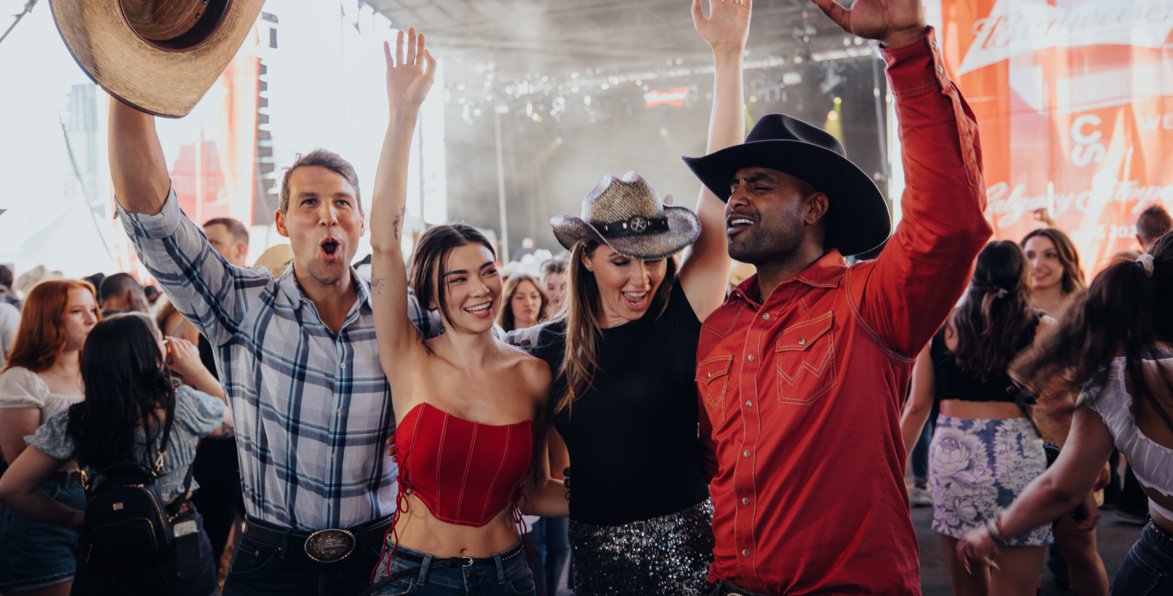 Friends dancing at Nashville North at the Calgary Stampede.