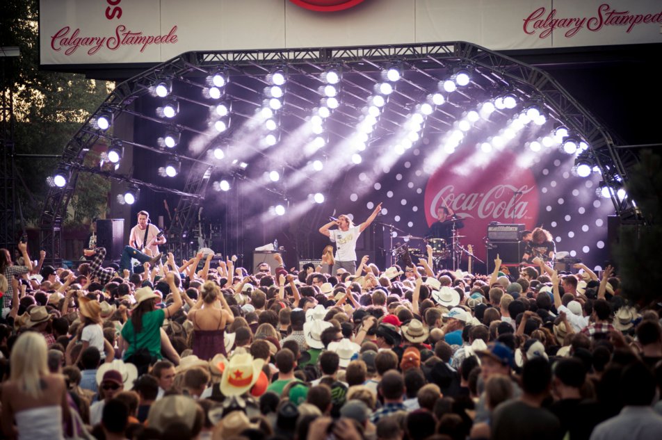 A band on the Coca-Cola Stage gets the crowd cheering and dancing.