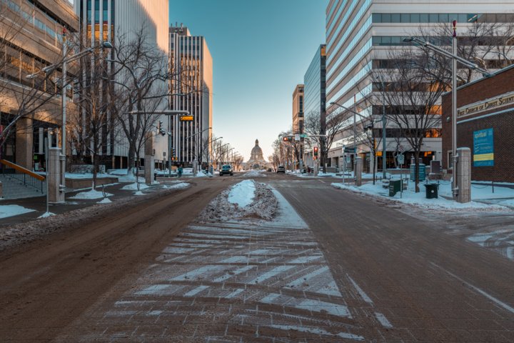 Looking at the Alberta Legislature Building down an Edmonton street