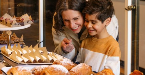 Mother and child excitedly admire and select a pastry at Sidewalk Citizen Bakery in Calgary’s East Village