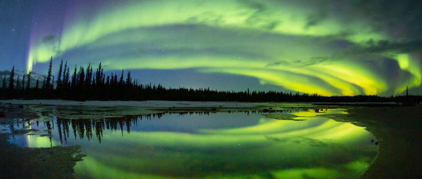 A night-sky image of the aurora borealis in Wood Buffalo National Park